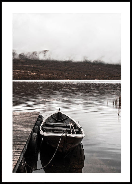 Boat In A Lake Near The Mountains Poster