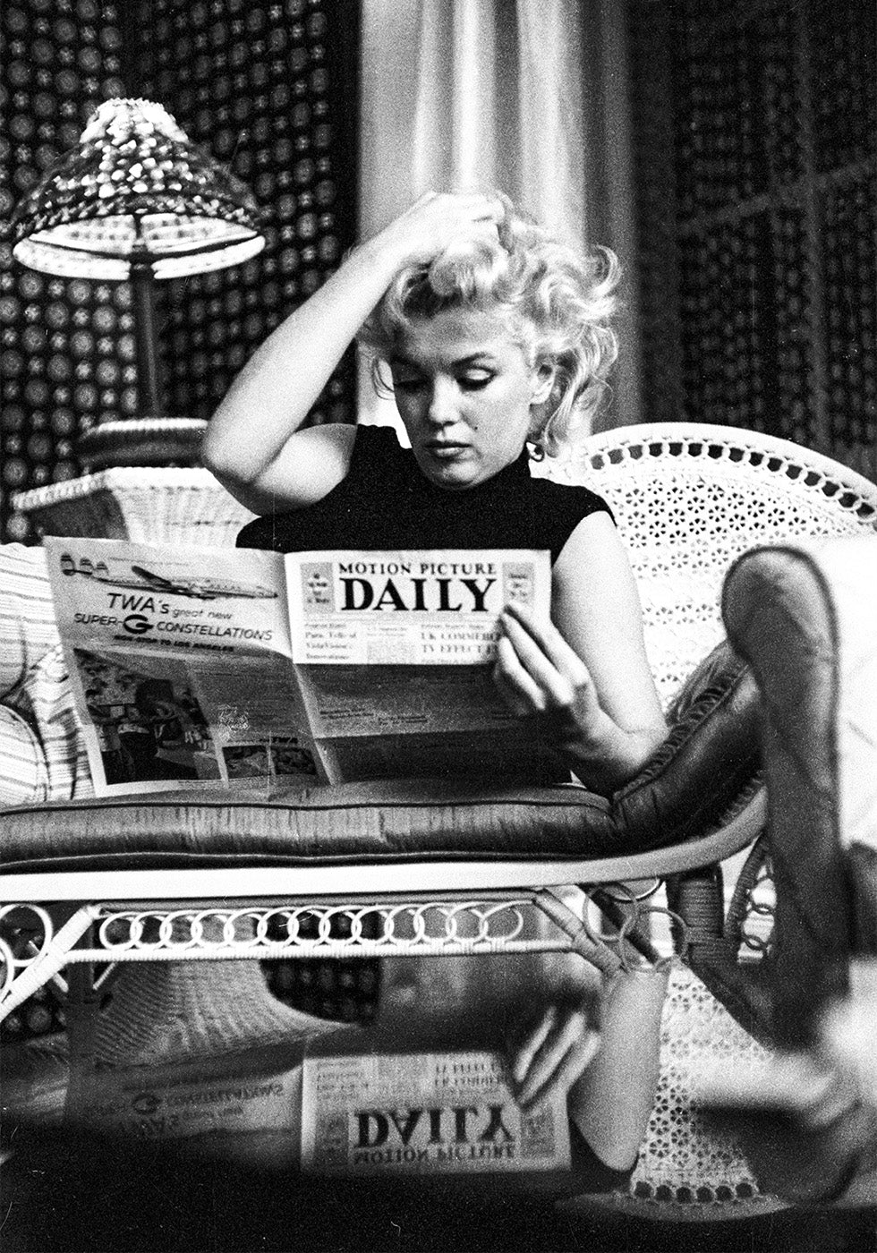 Marilyn Monroe Reading Newspapers Poster