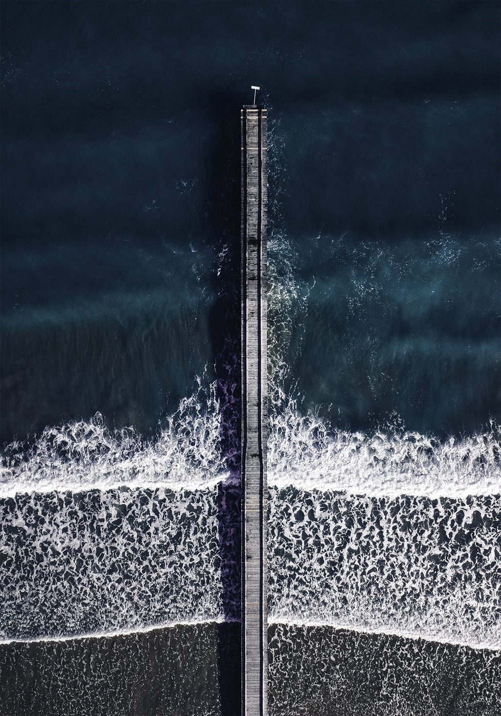 Pier Over Turquoise Waters Poster