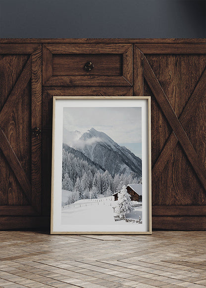 Snow-Covered Cabin in the Alps Poster