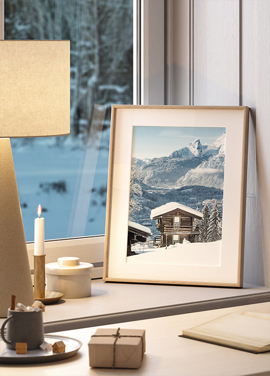 Quaint Snowy Cabin in Alpine Landscape Poster